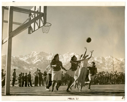 Photograph of a girls basketball game at Manzanar on February 13, 1943