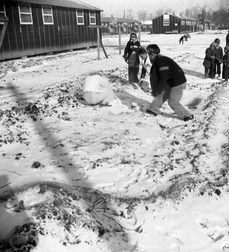 Playing in snow in Jerome camp