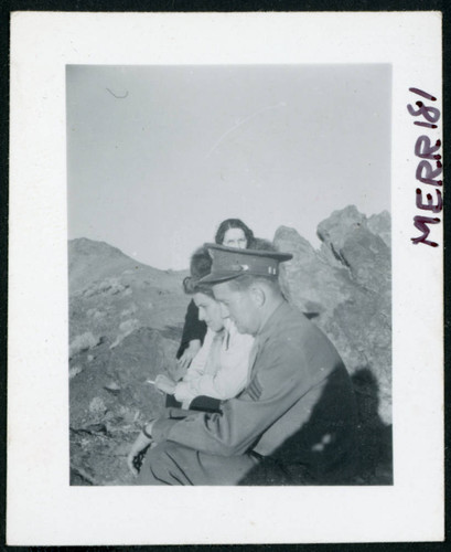 Photograph of L. Josephine Hawes, Mrs. Chamberlain and an army guard in Death Valley