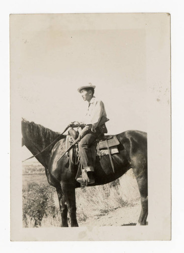 Albert Takeshi Takahashi riding horse