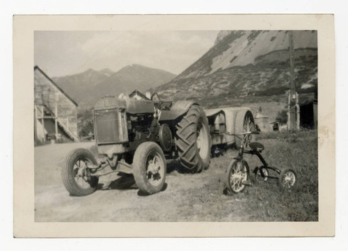 John Deere tractor and tricycle