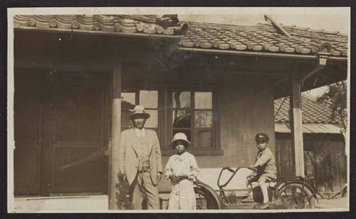 Family outside house