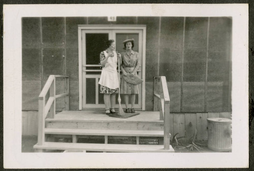 Women outside camp barrack