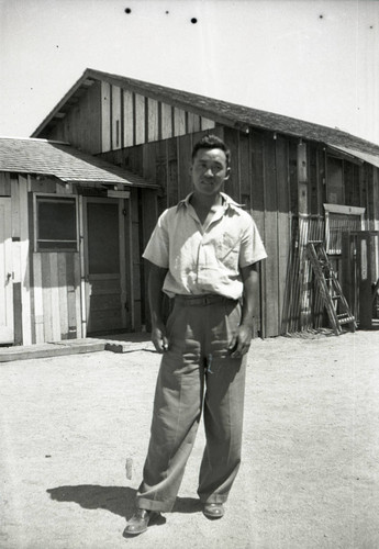 Man in front of building