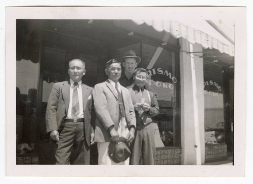 Group of men outside Pismo Poko