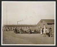 [People standing in line]