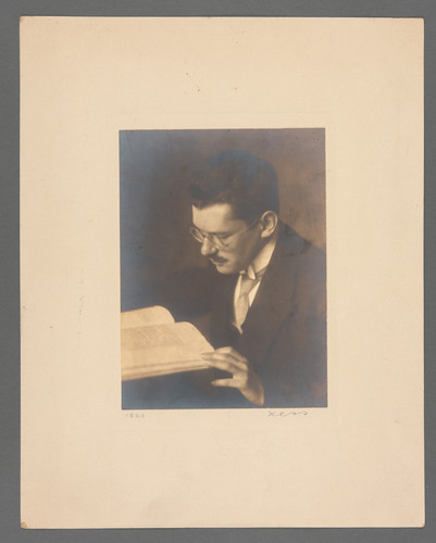 [Portrait of unidentified man looking down at book. Possibly Paul Ehrenfest.]