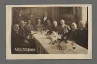 [Group portrait at banquet, including Otto Stern in front of table, Hamburg.]