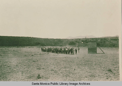 Boy Scouts gathering on a field in summer 1922, Temescal Canyon, Calif