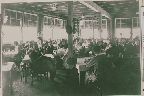 Diners inside the dining hall at Institute Camp in Temescal Canyon, Calif