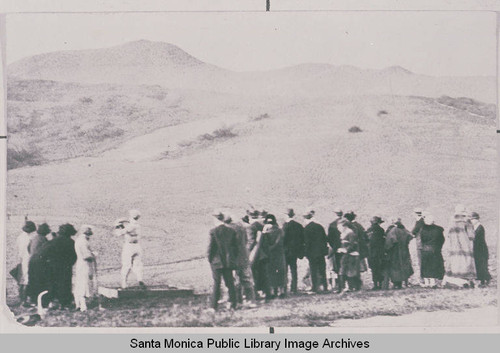 People on a golf course west of Temescal Canyon on the Mesa near Harmony Hall, February 1925