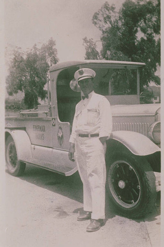 Edgemar Farms milkman H.B. Taylor and delivery truck in Pacific Palisades, Calif