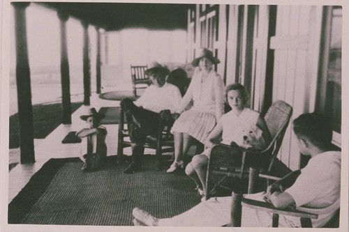 The Will Rogers family (Left to right: Jim, Will Sr., Betty, Mary, and Will Jr.) on the porch of the recently completed main house at Will Rogers Ranch