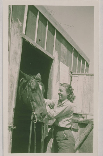 Mildred Swartz with her horse, "Suzy," Pacific Palisades, Calif