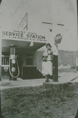 Tiny Marquez in front of the Marquez Family gas station, West End Service Station in Santa Monica Canyon