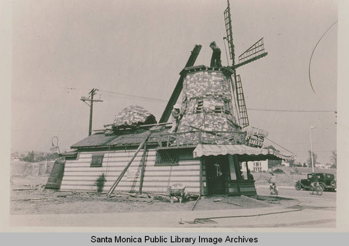 Van de Kamp's bakery on Via de La Paz and Sunset Blvd. in Pacific Palisades showing the building being dismantled for moving