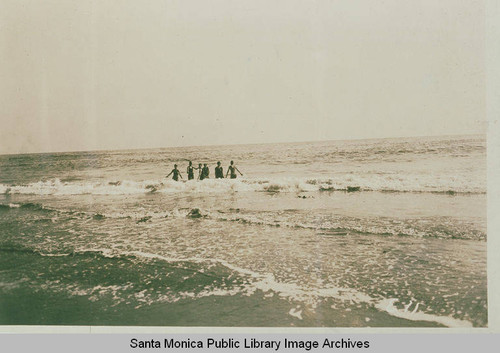 Bathers in the surf, Pacific Palisades, Calif