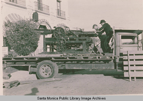 Unloading a printing press in the Business Block, Pacific Palisades, Calif