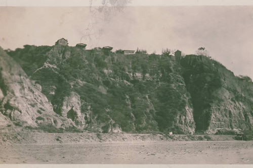 Shacks on top of a bluff in Huntington Palisades, Calif