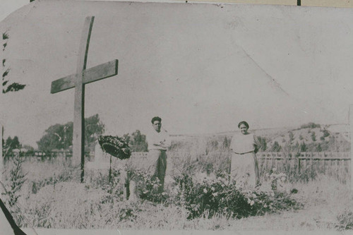 Members of the Marquez Family stand at the Cross in the Marquez Family cemetery in Santa Monica Canyon