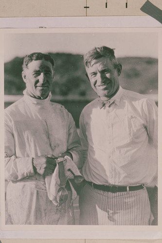 Will Rogers (right) with Fred Stone (left) after Stone landed his airplane at Will Roger's Ranch