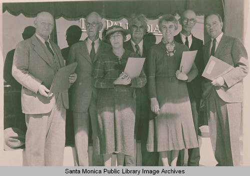 Portrait of the first staff of the "Palisadian" newspaper in front of the Business Block in Pacific Palisades