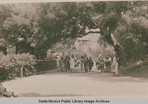 Assembly Camp, walking from the Tabernacle in Temescal Canyon with a bell tower in the background