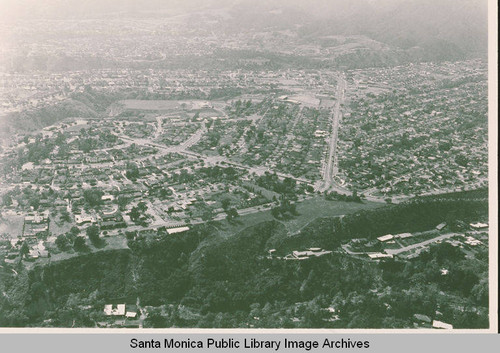 Aerial view of Pacific Palisades, Calif. with Sunset Blvd center right and Rustic Canyon in the foreground