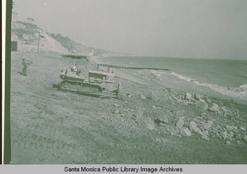 Protecting the Pacific Coast Highway at Sunset Blvd. by constructing a barrier of rocks