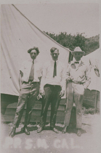 Tony La Porte and two other men in front of a tent in Temescal Canyon, Calif