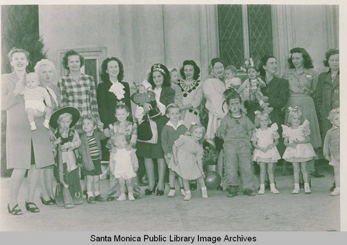 Parents with some children in costume, Pacific Palisades, Calif