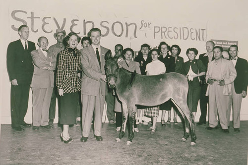 Group of "Stevenson for President" supporters standing with a donkey symbolizing the Democratic Party, Pacific Palisades, Calif