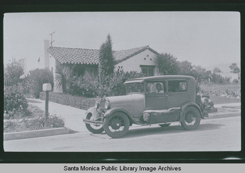 Zola Clearwater in a car parked in front of the Clearwater house in Pacific Palisades, Calif