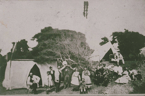 Adults and children camping in Santa Monica Canyon, Calif