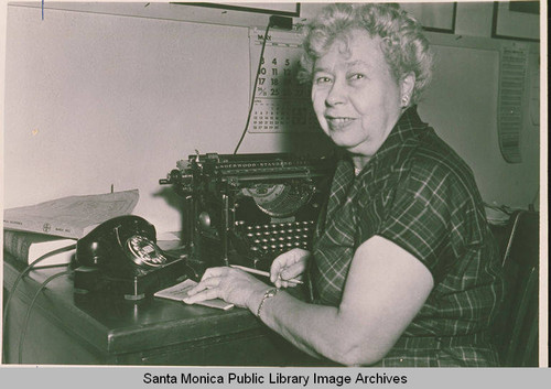 Bea Clark, Palisadian newspaper Society Editor, at work in her office