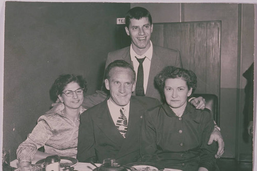 Comedian Jerry Lewis (standing) with Chamber of Commerce members at the dinner party celebrating his induction as Honorary Mayor of Pacific Palisades, Calif