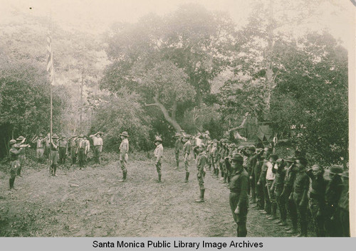 Boy Scouts raising an American flag, summer 1922, Temescal Canyon, Calif