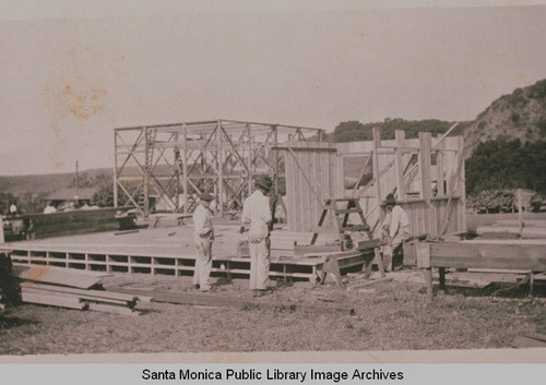 Men work at Construction Center, Assembly Camp in Temescal Canyon, Pacific Palisades, Calif