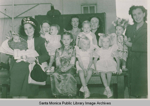 Parents with some children in costume, Pacific Palisades, Calif