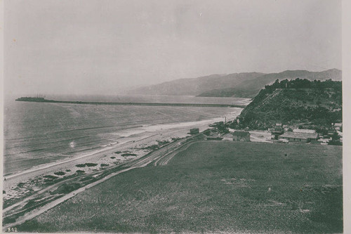 Fields at the bottom of Santa Monica Canyon with the Long Wharf in the background