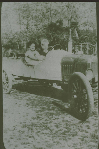 Tiny Marquez with the Marquez gas station attendant in Santa Monica Canyon