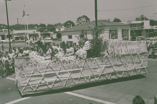 Women riding a float in the Pacific Palisades Fiesta Day Parade