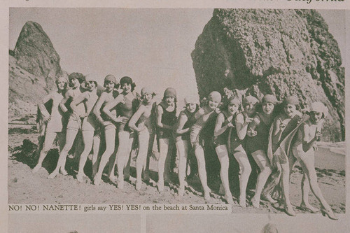 Group of women in bathing suits posing on Santa Monica beach appearing in an article for "Pictorial California Magazine."