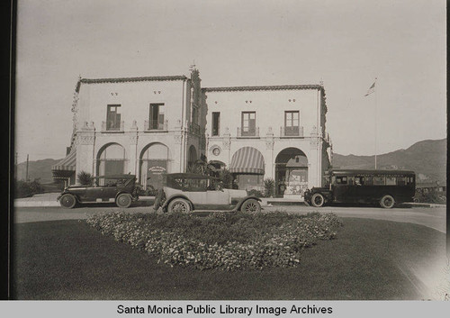 Automobiles parked in front of the Pacific Palisades Business Block