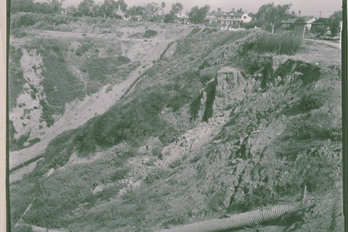 Landslide damage in Las Pulgas Canyon, Calif