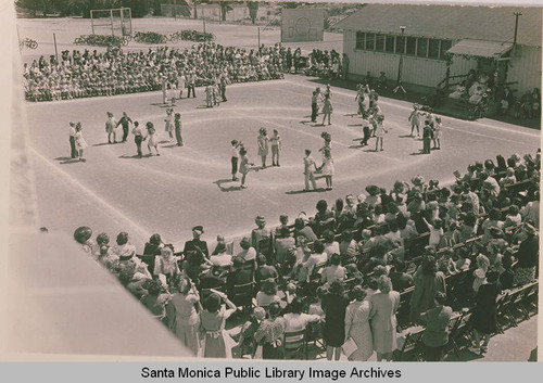 Audience watching children dancing at Pacific Palisades Elementary School on Via de la Paz