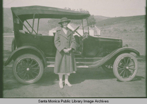 Zola Clearwater in front of a car near Founder's Oak Island in Pacific Palisades, Calif