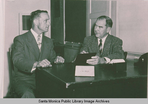 Real estate agent J. W. Pixley (right) with unidentified man in Pacific Palisades, Calif