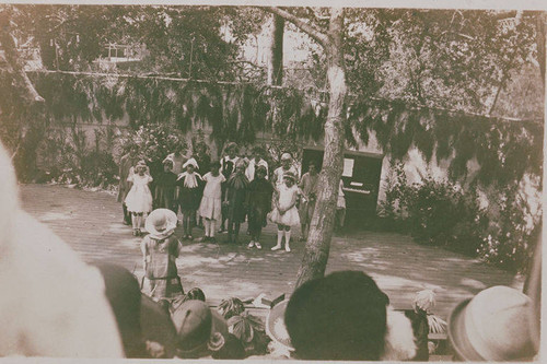 Audience watches a play being performed at the amphitheater in Temescal Canyon