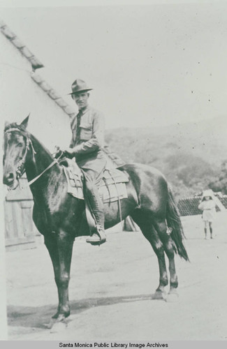 Clark Standiford (superintendent of construction) on horseback, Pacific Palisades, Calif